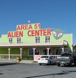 a building facade with a huge sign Area 51 Alien Center